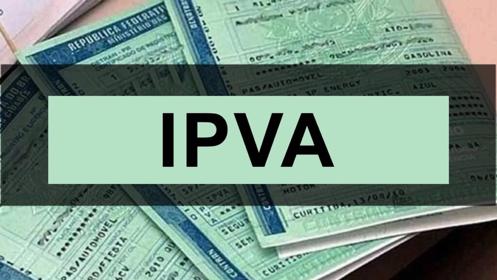 Foto ilustrativa de documentos com o nome IPVA 2024 ES no centro