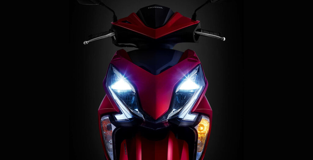 Honda Elite 125 vermelha faróis acessos