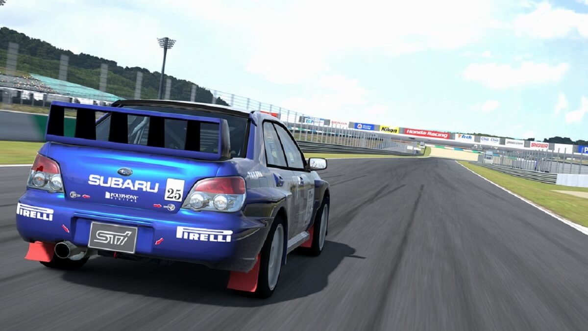 Melhores jogos de corrida para PS3, um carro azul em alta velocidade em uma pista de corrida