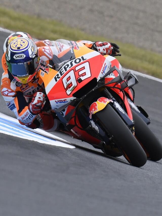 Piloto da MotoGP fazendo curva na pista de corrida