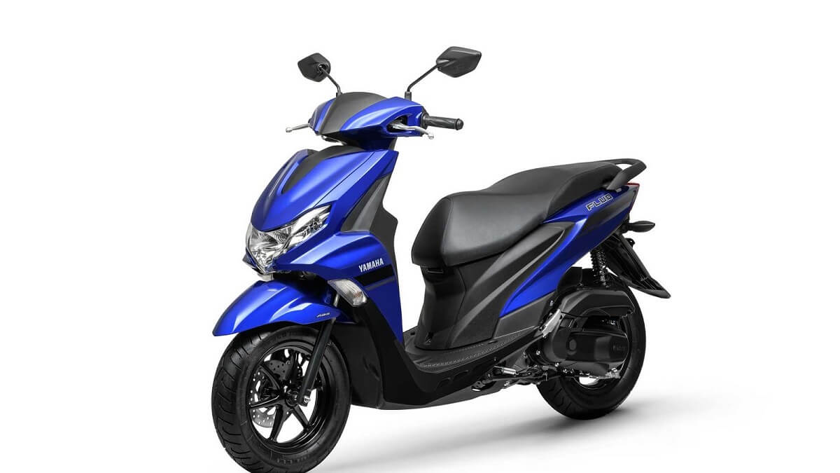 Fluo 125 ABS azul, pneus pretos e com um fundo todo branco