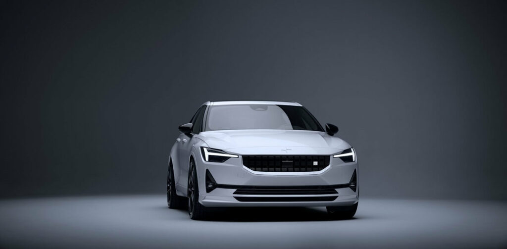 Foto frontal de um Polesar 2 da empresa Polestar, o carro é branco