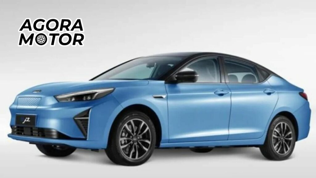 Foto de um EJ7 azul em um estúdio de fotos