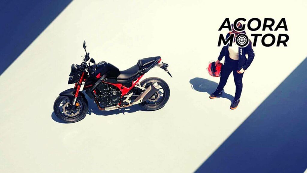 Foto de uma mulher ao lado de uma Hornet 2023