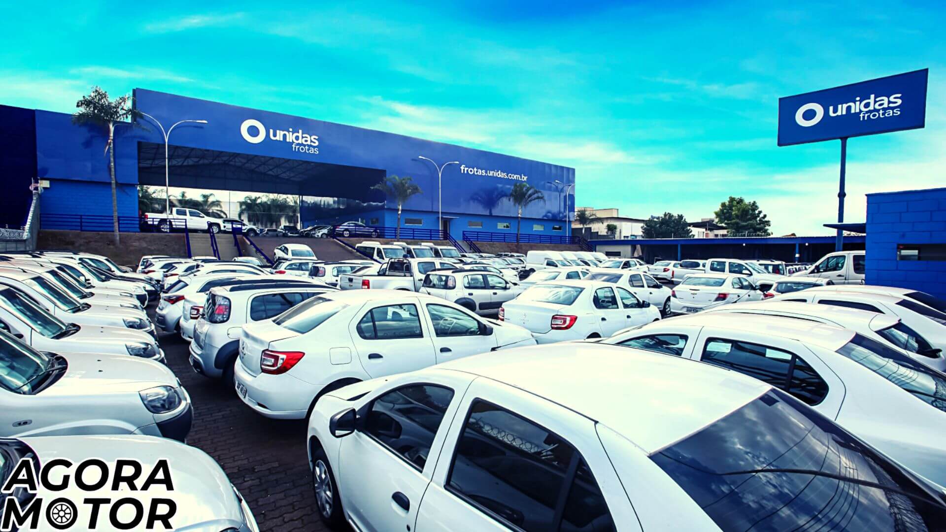 Foto da faixada da Unidas, uma locadora de veículos, que aluga carro para quem trabalha de Uber