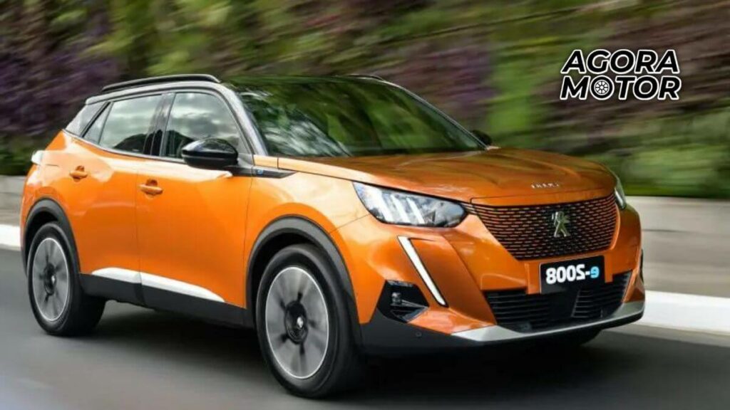 Foto frontal de um e-2008 laranja 2023