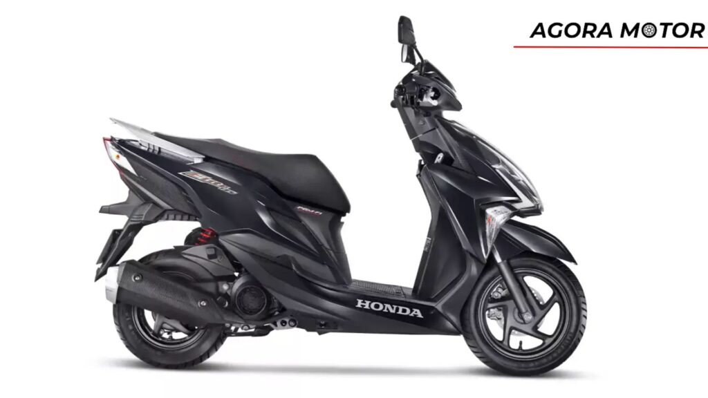 Lateral da Honda Elite, na cor preta.