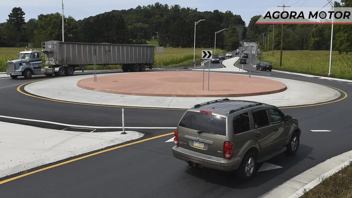 Como faço para dirigir em uma rotatória?