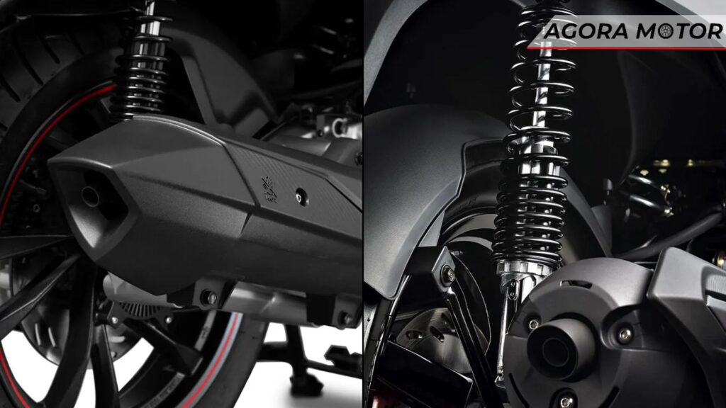 Cano e suspensão da moto.