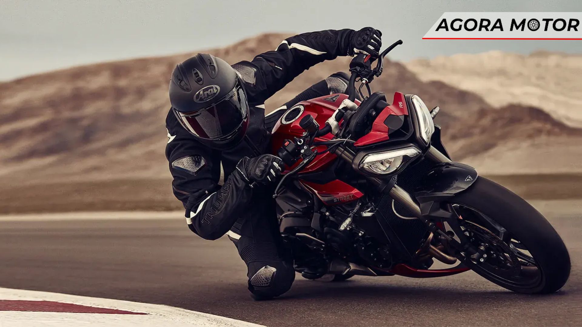 Street Triple 765 2024 em uma curva.