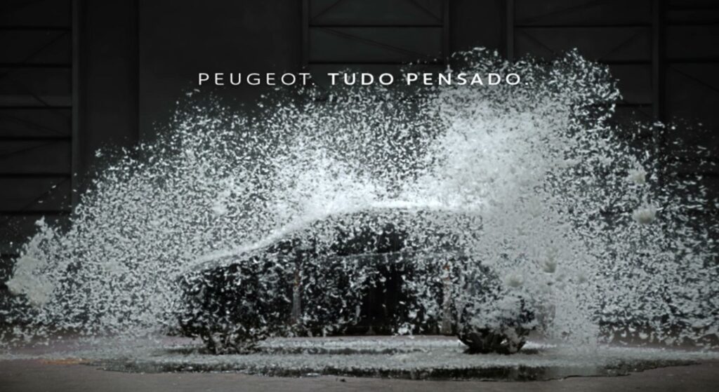 Um carro da Peugeot com legenda Peugeot tudo pensado.