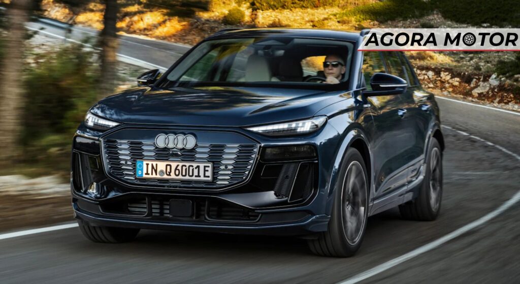 Audi Q6 e-tron preto em velocidade.