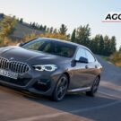 BMW cinza em velocidade.