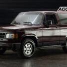 Chevrolet Bonanza preto de lado.