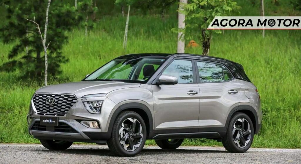 Hyundai Creta prata parado de lado.