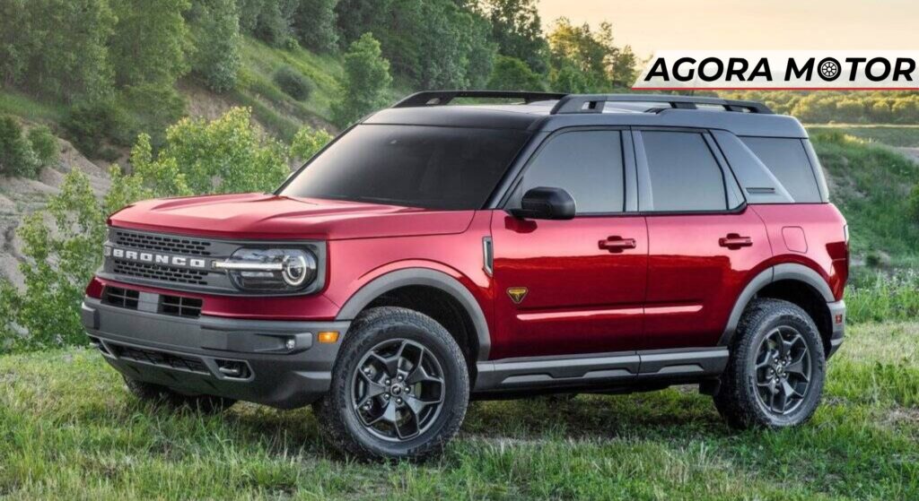 Ford Branco vermelho parado de lado.