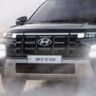 Hyundai Creta preto em velocidade.