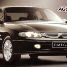 Chevrolet Omega preto parado de frente.