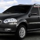 Fiat Palio Weekend preto parado de lado.