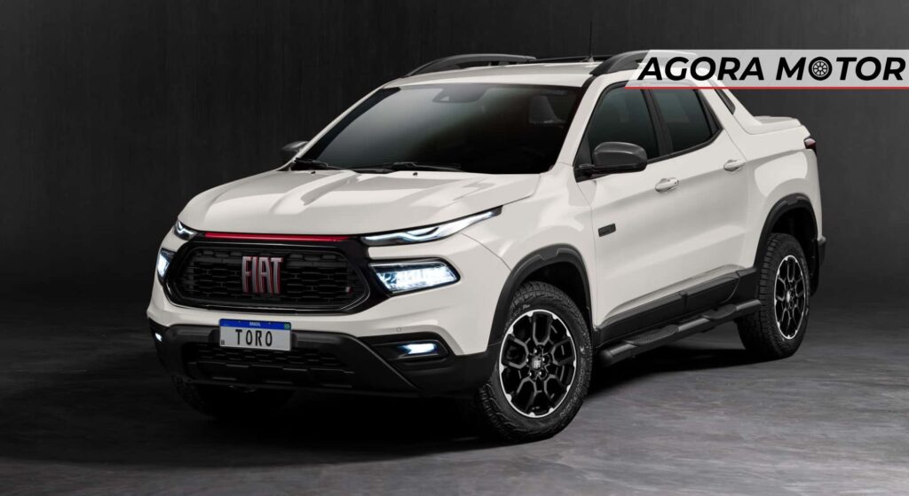 Fiat Strada branco parado na diagonal.