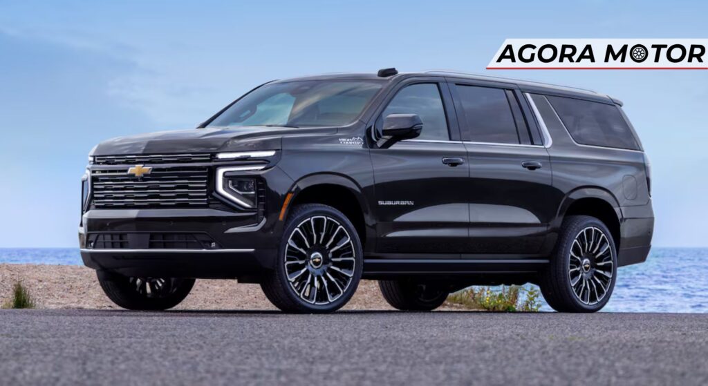 Chevrolet Suburban preto parado na diagonal.