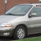 Ford Windstar prata de lado.