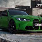 BMW verde parado na diagonal.