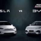 dois carro, um da marca Tesla e outro da marca BYD.