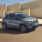 Renault Kwid E-tech verde em movimento.