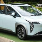 Carro da GAC branco parado de lado.