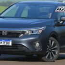 Honda City cinza em velocidade.