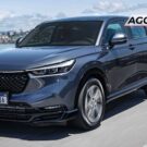 Honda HR-V azul em velocidade.