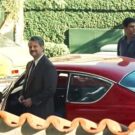 Kadett vermelho usado em ainda estou aqui com os atores do lado.