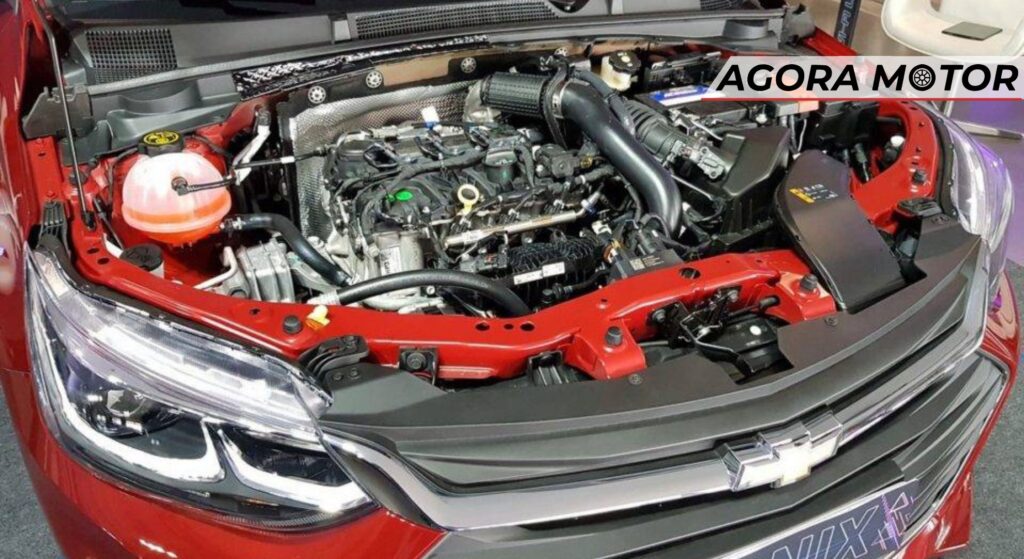 Motor do Chevrolet Onix vermelho.