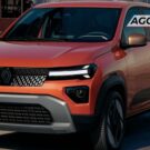 Renault Kwid laranja futurista parado na diagonal.