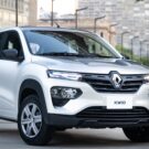 Renault Kwid prata virando uma curva.