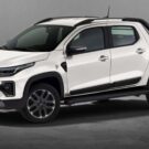 Fiat Strada 2026 branca parada na diagonal em um fundo cinza.