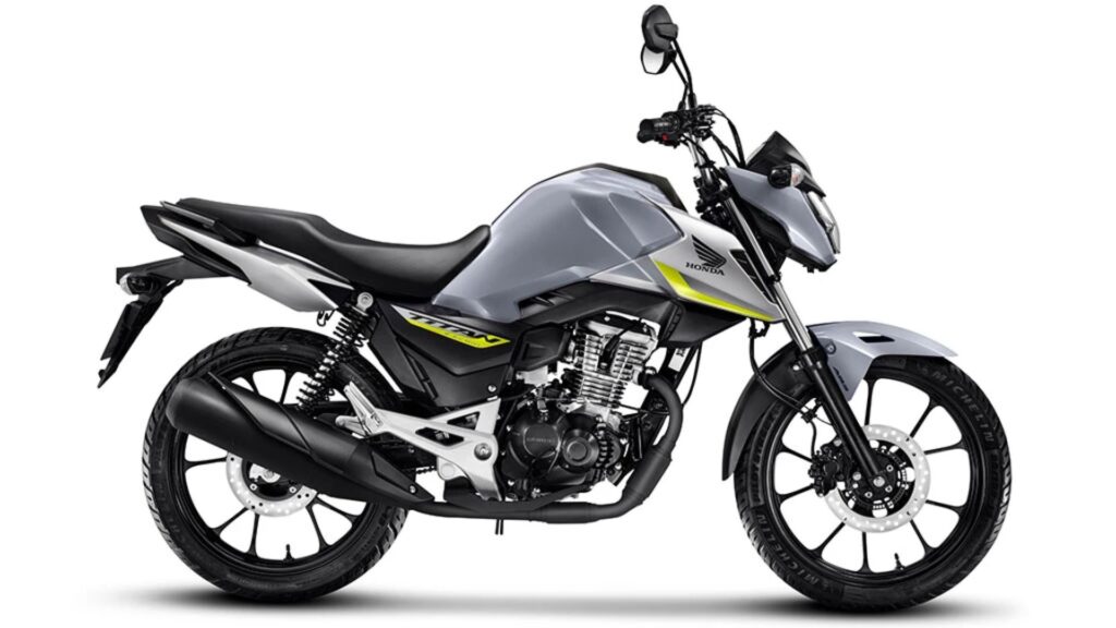 Honda CG 160 2026 cinza com alguns detalhes em verde.