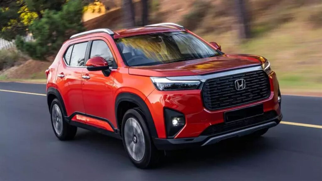 Honda WR-V 2026 vermelho em movimento na estrada.