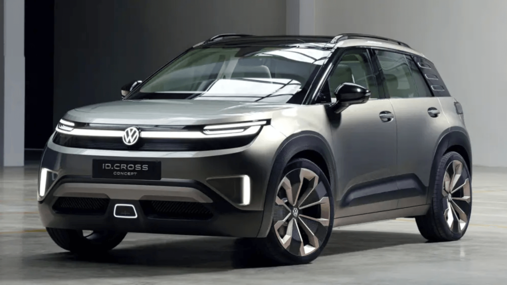 Nova geração do Volkswagen T-cross cinza parado na diagonal em um fundo cinza.