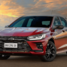 onix vermelho parado na diagonal