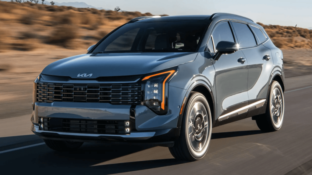 Kia Sportage 2026 cinza em movimento.
