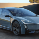 Toyota corolla cinza parado na diagonal.